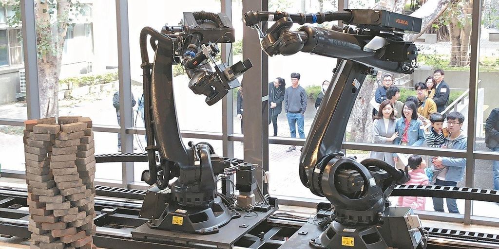 robotic arms in a modern factory