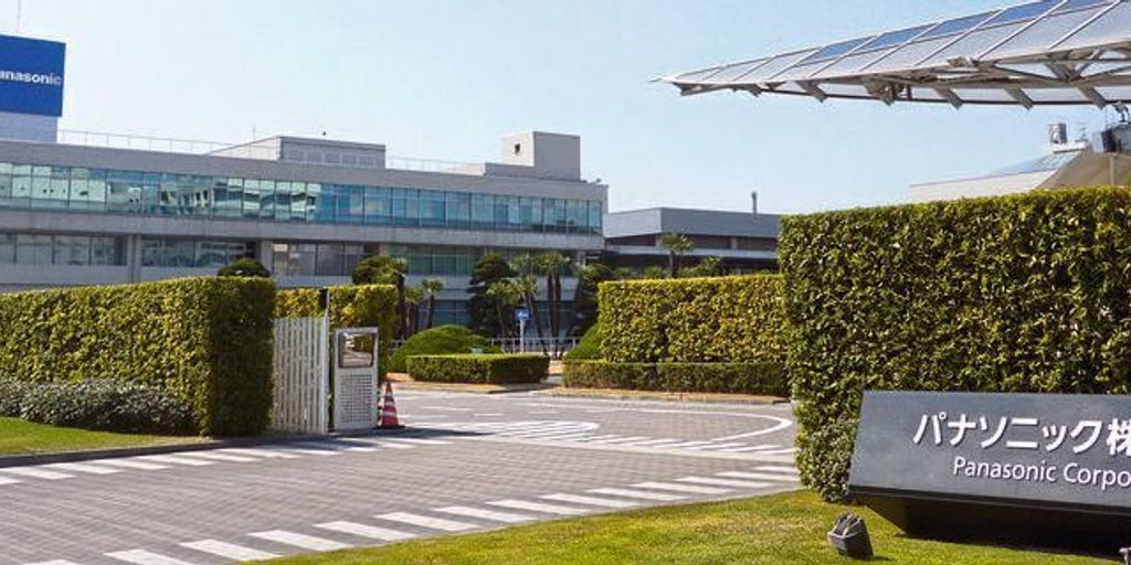 modern semiconductor manufacturing facility with engineers working